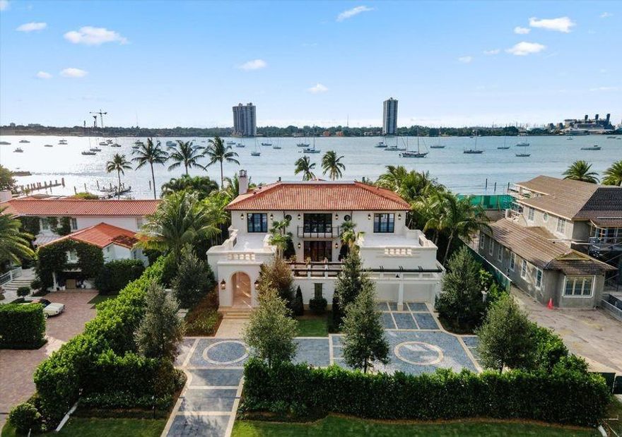 Completed new construction direct Intracoastal estate residence with concrete dockage. Stunning Art Deco styled residence with several ''flex'' rooms featuring walk-in closets and full baths allowing as many as 6 bedrooms/baths. Heavily landscaped grounds with multiple outdoor entertainment areas - courtyards and fountains. Motor court. HVAC oversized garage. Dramatic pool area - complete privacy from bike path. Steps to Palmo - Town Park and fantastic beach. Huge second story patios invite the best of indoor/outdoor living. Dream kitchen, dining seats 12-14 and dramatic visible wine storage. High elevation. Turn-key staged. Furniture available in whole or part, separately from stager. We are pleased to present this property which features several flexible spaces that can be crafted to suit your families particular needs and taste.