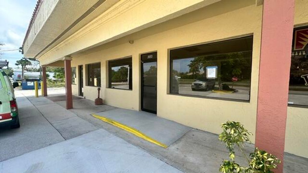 Photo of 1302 SW Bayshore Boulevard, Port Saint Lucie, FL 34983 (MLS # B26035693)