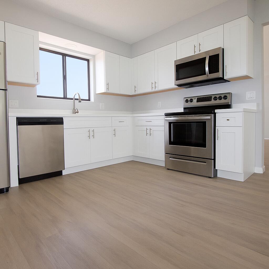 Completely Renovated villa with 2 bedrooms & 2 beautifully renovated bathrooms. Brand new kitchen with white shaker custom cabinetry, plank flooring, brand new appliances, new bathrooms with custom vanities, new fixtures, all freshly painted thru out. BACKYARD AREA to spread out and enjoy south Florida living at its best. he biggest unit available for the price. Come today! Located near Northlake Blvd, close to beaches, shopping, restaurants, easy access to 95, only 10 minutes north of downtown West Palm Beach.