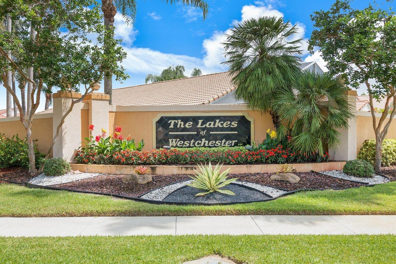 This charming home is sited on the best lot in The Lakes of Westchester, an ideal South Florida gated community set amongst the rolling greens and fairways of Westchester Country Club. NO MANDATORY MEMBERSHIP FEES HERE. Enjoy some of the best long water and golf course views in town through three picture windows or the private screened patio. Located at the end of a dead-end street with just one neighbor, you will appreciate the privacy this home provides. This all ages community features great amenities a short walk from the front door, with a tennis court, tot-lot, pool, and clubhouse. Vaulted ceilings, an abundance of windows, and a rare skylight in the kitchen provide tons of natural light. Accordion shutters. Sauna. Freshly painted, this home is ready for the next family to enjoy.