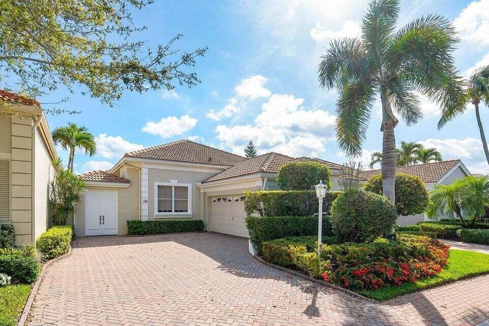 Photo of 109 Coral Cay Drive, Palm Beach Gardens, FL 33418 (MLS # R11001051)