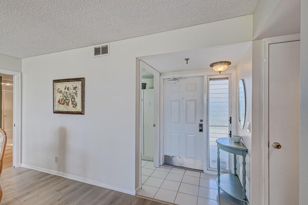 Photo of 5390 Woodland Lakes Drive #305, Palm Beach Gardens, FL 33418 (MLS # R11100875)