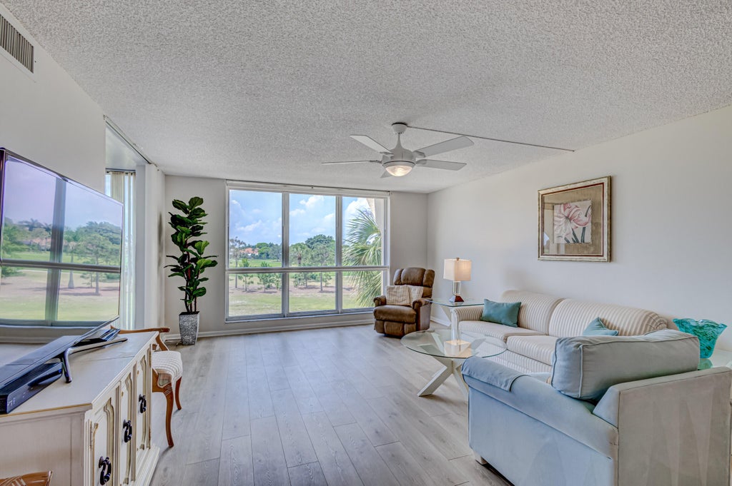 Photo of 5390 Woodland Lakes Drive #305, Palm Beach Gardens, FL 33418 (MLS # R11100875)