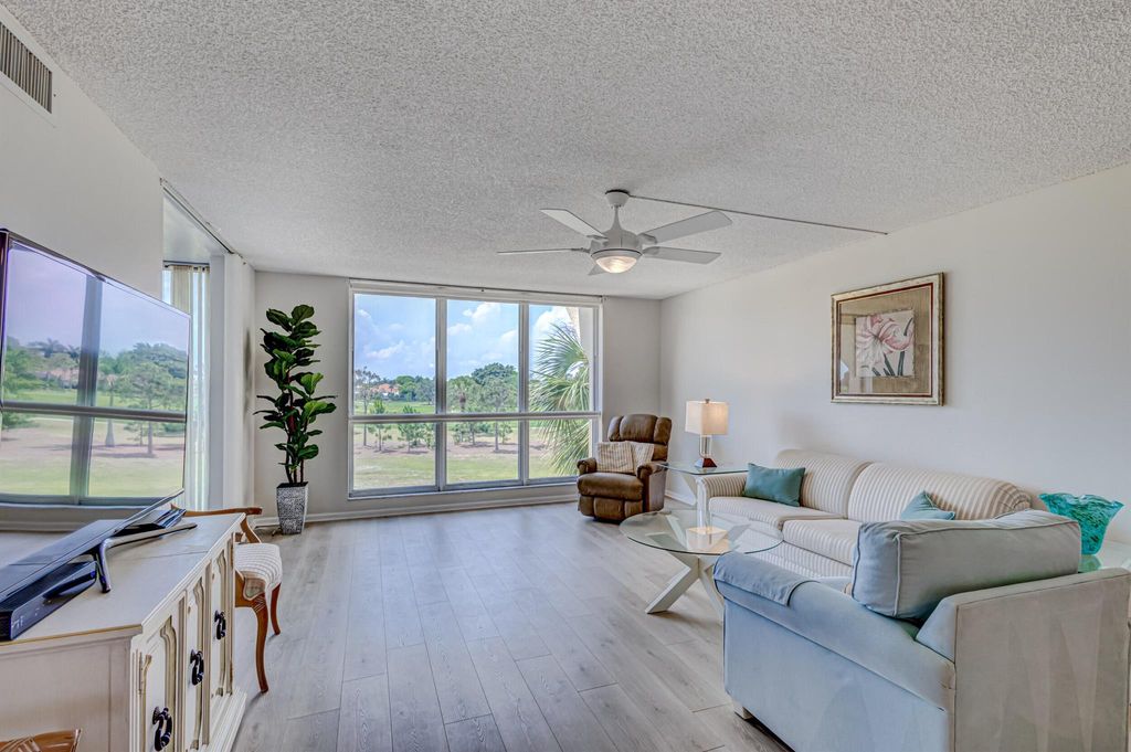 Photo of 5390 Woodland Lakes Drive #305, Palm Beach Gardens, FL 33418 (MLS # R11100875)