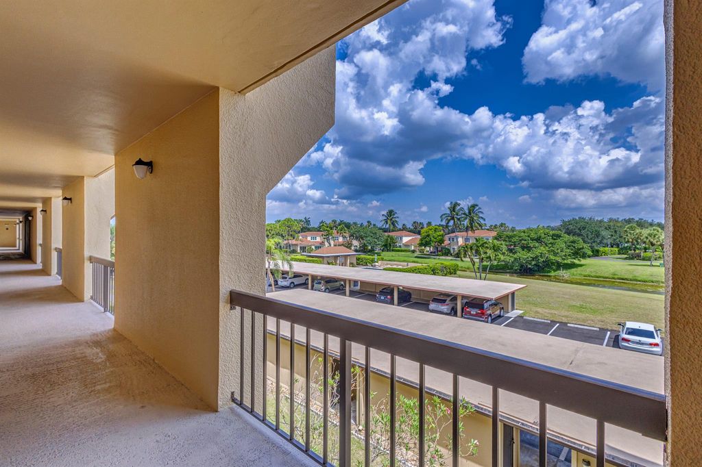 Photo of 5390 Woodland Lakes Drive #305, Palm Beach Gardens, FL 33418 (MLS # R11100875)