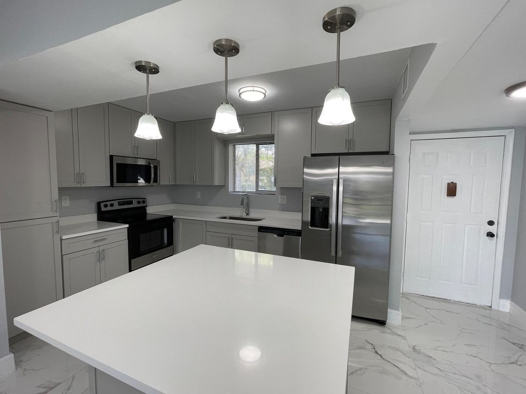 Photo of 9509 SW 1st Court, Coral Springs, FL 33071 (MLS # B26027172)