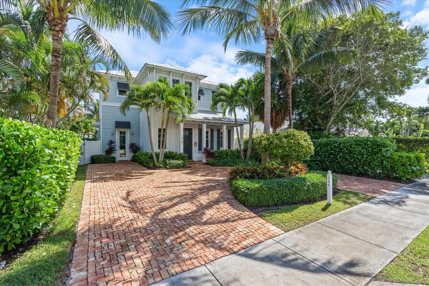 Welcome to 329 NE 7th Ave, a stunning single-family home in the sought-after Palm Trail neighborhood in the heart of vibrant Delray Beach. This beautifully designed home blends modern luxury with timeless elegance, offering a perfect oasis just minutes from the beach and bustling downtown.Designed by Richard Jones and built by RTG in 2017, the thoughtfully designed home offers a welcoming and functional floor plan with high-end finishes and thoughtful details that make everyday living both comfortable and beautiful. The seamless flow between the kitchen, dining, and living spaces presents a wide-open view of the picturesque backyard oasis. Large glass doors spanning almost the entire width of the home invite easy indoor/outdoor living, perfect for Florida's lifestyle.