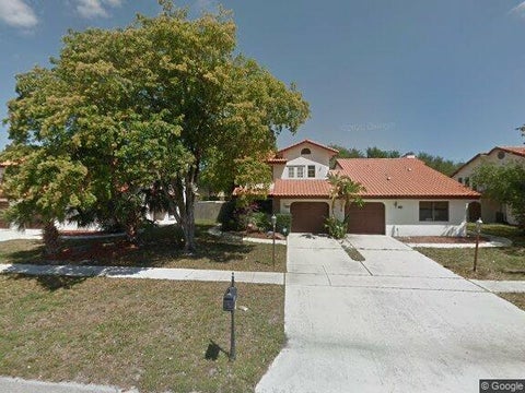 Photo of 441 NE 38th Street, Boca Raton, FL 33431 (MLS # B26035125)