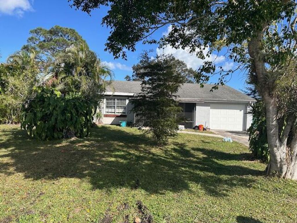 Photo of 2055 SE Triumph Road, Port Saint Lucie, FL 34952 (MLS # R10954415)