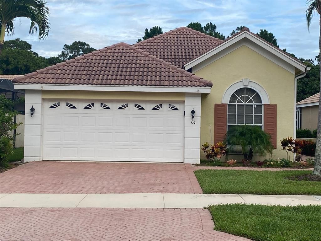 Photo of 716 SW Munjack Circle, Port Saint Lucie, FL 34986 (MLS # R10723055)