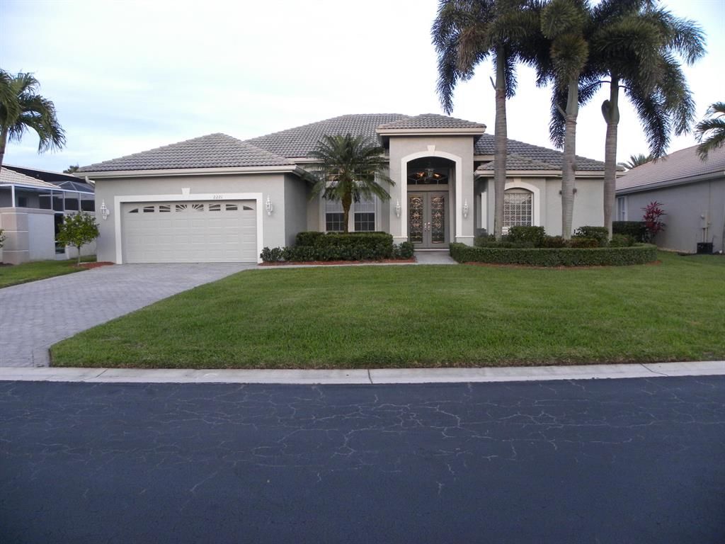 Photo of 2221 SE Stonehaven Road, Port Saint Lucie, FL 34952 (MLS # R10703166)