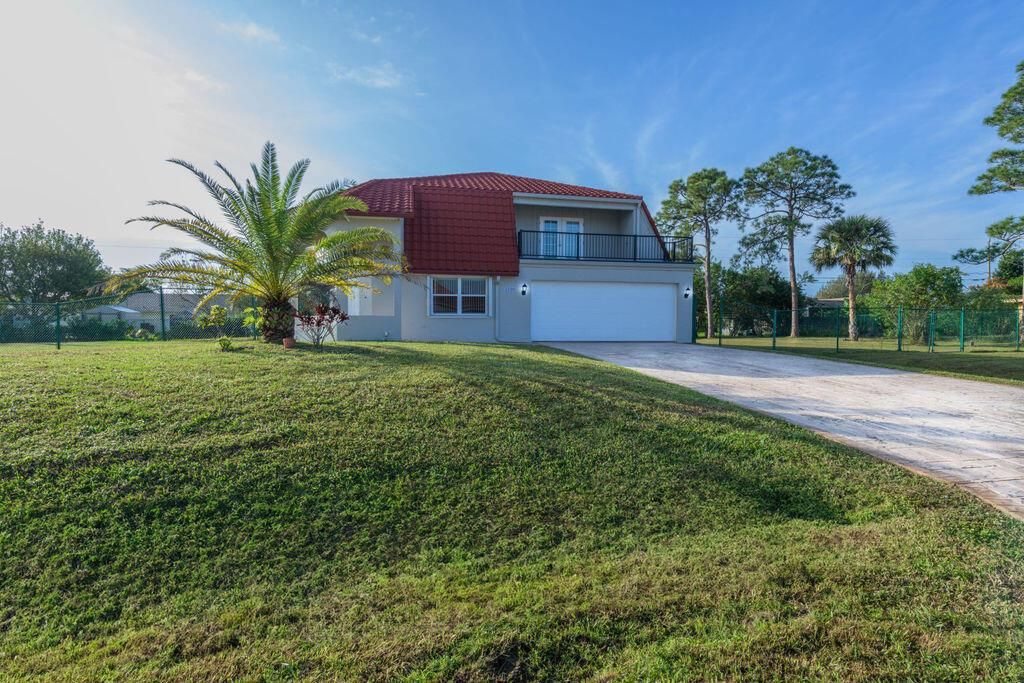 Photo of 1250 SW San Antonio Avenue, Port Saint Lucie, FL 34953 (MLS # R11120095)