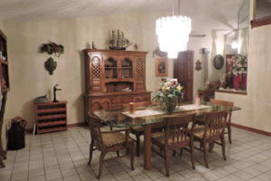 3/2/2 Corner lot. Beautiful, clean, larger home in the area. 2453 SQ FT under air.  Oversize drive way.  SS Appliances, sprinkler system, sky lights, laminate flooring, filtration system, fruit trees, manicured yard, shutters and more... Buyer to verify measurements