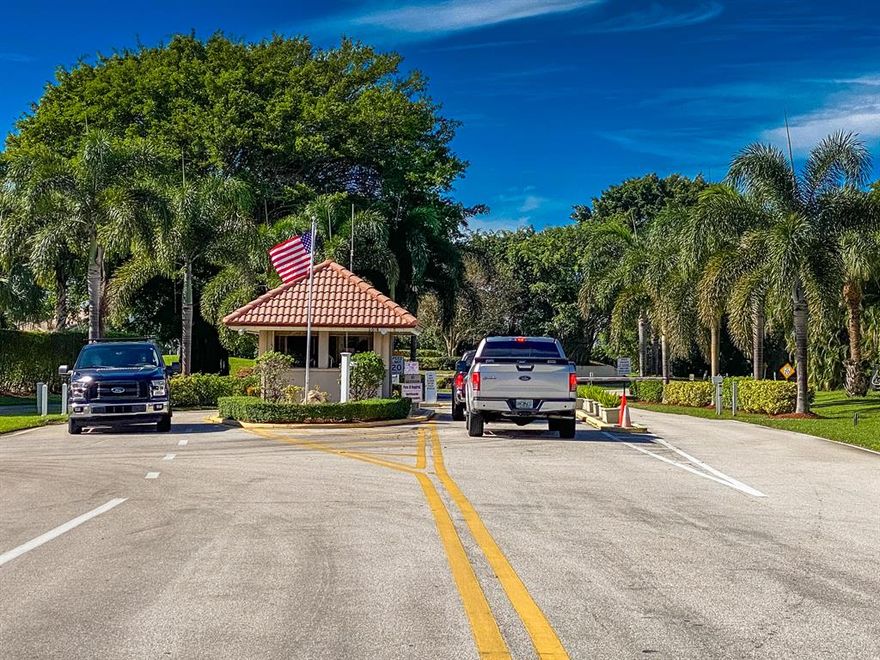 Gorgeous first floor corner unit with beautiful golf and water views. Remodeled and ready for you. Eat in kitchen, separate den or third bedroom. Wide expansive floor plan and split bedrooms.  Magnificent country club with golf , tennis, resort size pool, restaurant. Membership is available but not mandatory.  Assigned parking and guest parking.