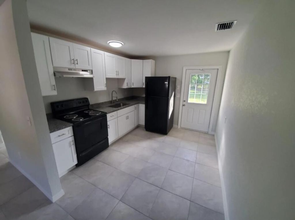 Photo of 4001 Ave I, Fort Pierce, FL 34947 (MLS # R11100711)