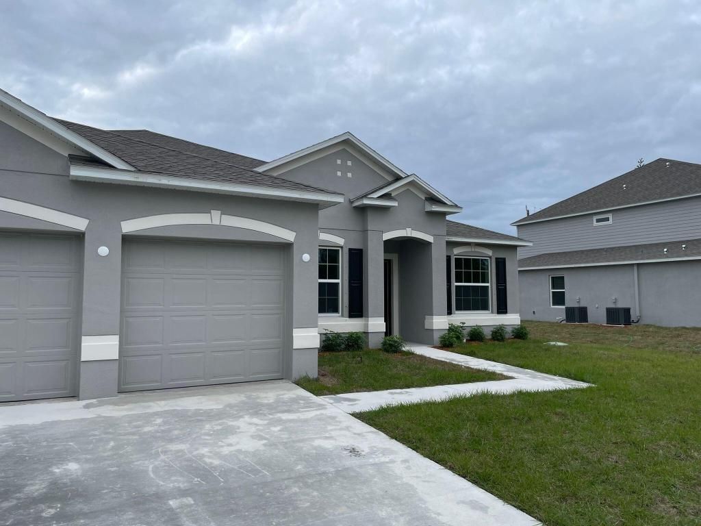 Photo of 2026 SW Beauregard Street, Port Saint Lucie, FL 34953 (MLS # R10948374)