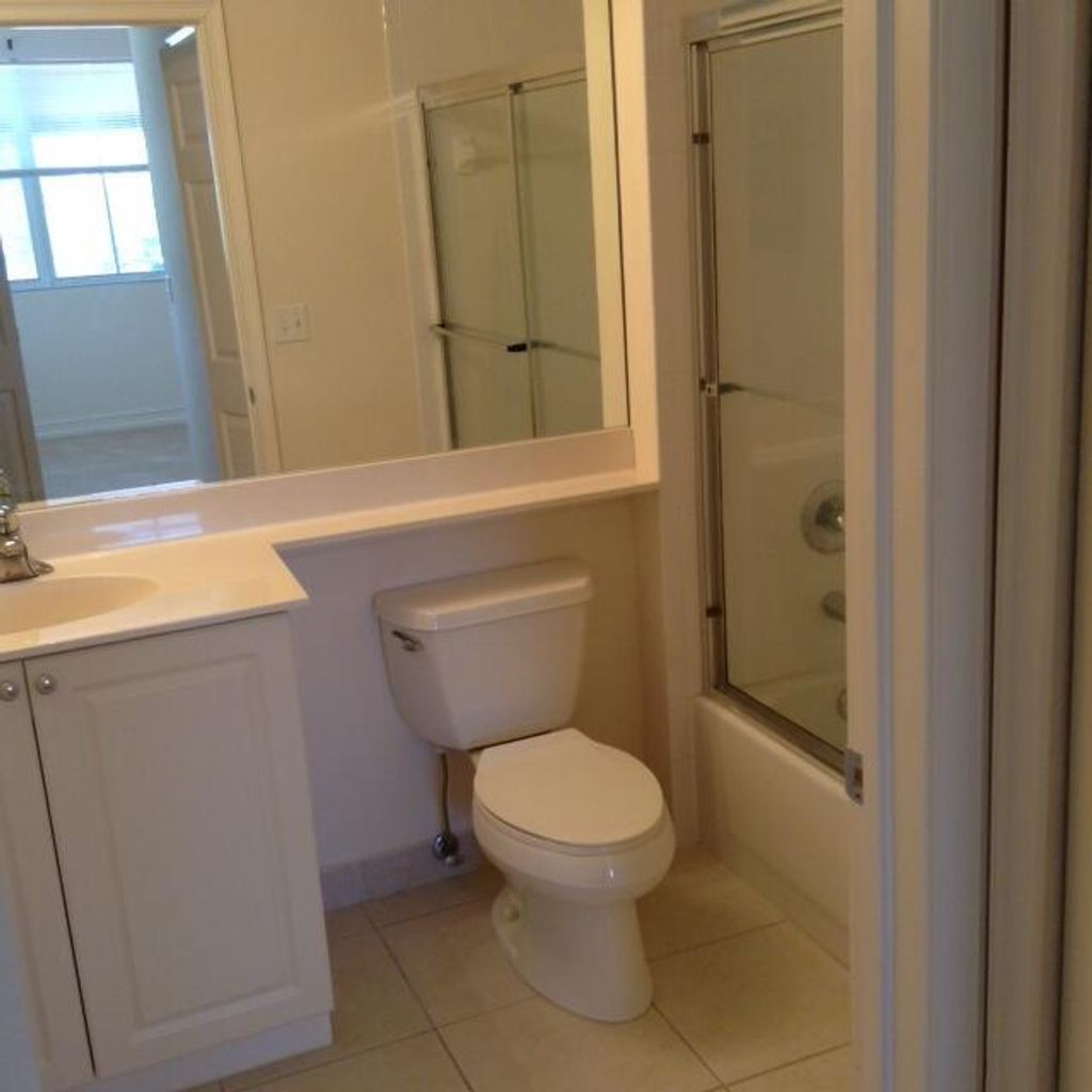 Photo of 4610 Pga Boulevard #205, Palm Beach Gardens, FL 33418 (MLS # R10935095)