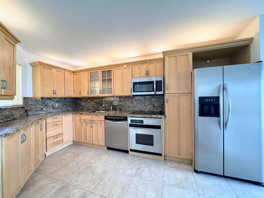 Photo of 5701 Camino Del Sol #403, Boca Raton, FL 33433 (MLS # R11119949)