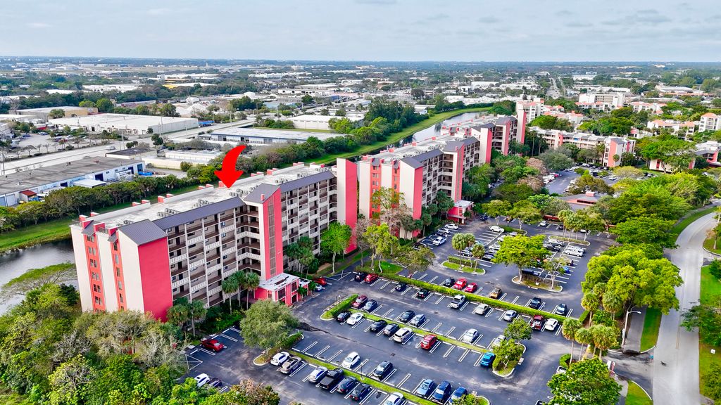 Photo of 2200 S Cypress Bend Drive S #702, Pompano Beach, FL 33069 (MLS # B26000323)