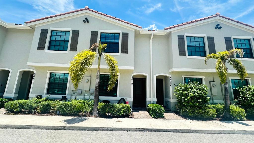 Photo of 5012 Genove Pl, Riviera Beach, FL 33410 (MLS # R11101093)