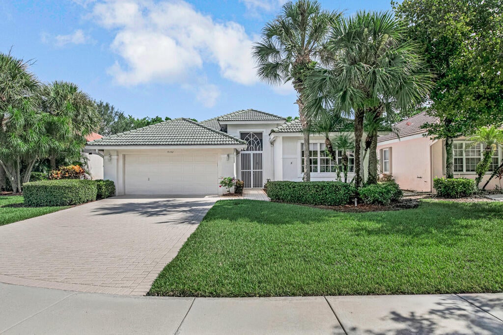 Photo of 9152 Bay Harbour Circle, West Palm Beach, FL 33411 (MLS # B26070220)