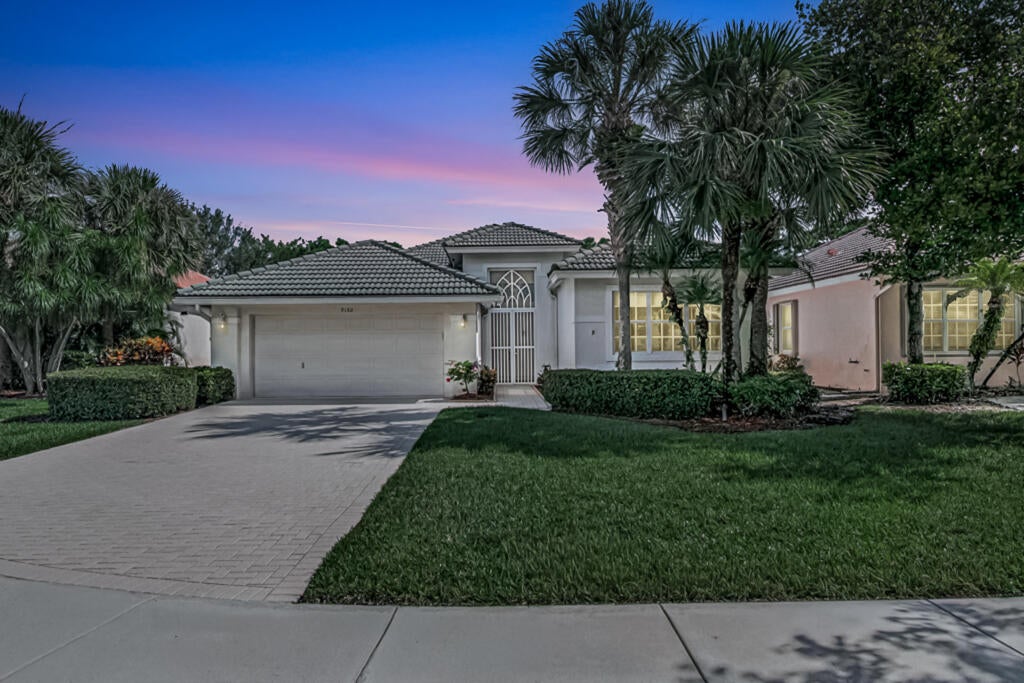 Photo of 9152 Bay Harbour Circle, West Palm Beach, FL 33411 (MLS # B26070220)