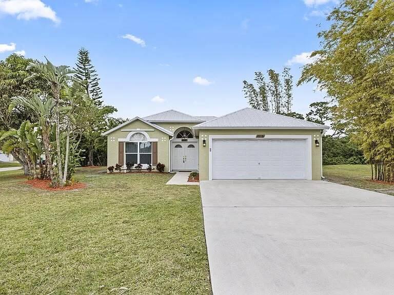 Photo of 2218 SE SEAMIST Street, Port Saint Lucie, FL 34952 (MLS # B26057698)