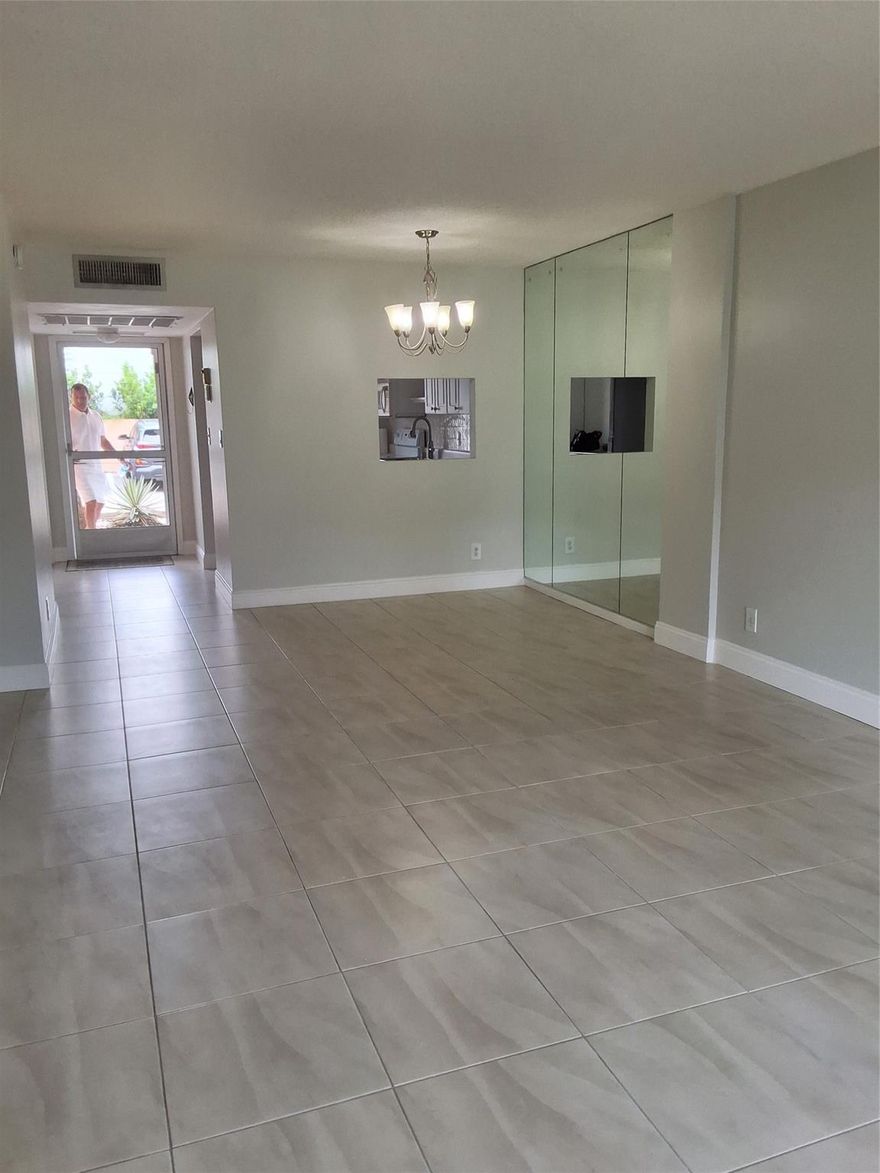 Move-In Ready in Lighthouse Point! 
Freshly painted 2-bedroom, 2-bath first-floor apartment featuring tile floors and a bright open floor plan. Relax and enjoy the Florida breeze in the enclosed porch. Conveniently located near shops, dining, and all the essentials you and your family need. Water included! 
No pets allowed per HOA.