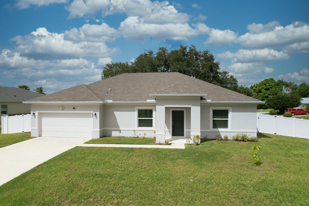 Photo of 592 SW Dauphin Avenue, Port Saint Lucie, FL 34953 (MLS # B26060844)