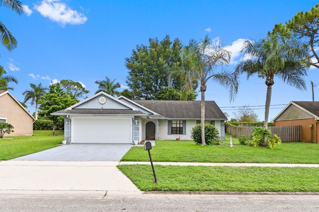 Photo of 106 Sherwood Drive, Royal Palm Beach, FL 33411 (MLS # R11018256)