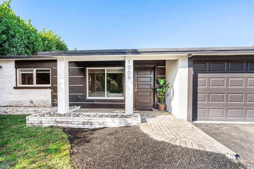 Stop your search! Beautiful 2BR/2BA CBS home with a one-car garage and no HOA. Features crown molding and tile throughout. Impact windows and doors, 2018 roof and 2020 A/C offer peace of mind. Features include a shiplap accent wall with TV included, Stacked-bedroom layout, and a kitchen with quartz countertops. Enjoy a private fenced backyard, large shed, and covered outdoor bar--perfect for entertaining. Plenty of room for boat/RV Parking. Close to the highway and beaches!