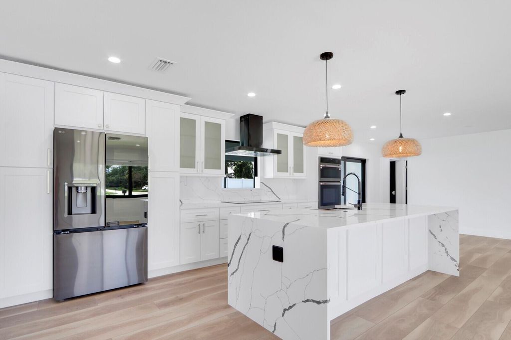 Photo of 4270 Gardenia Drive, Palm Beach Gardens, FL 33410 (MLS # R10977631)