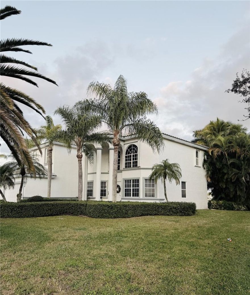 Discover lakefront living at its finest in this stunning 5 bedroom, 3 bath, two story home in prestigious Grand Isle. Perfectly positioned on the water, this spacious residence offers breathtaking lake views and an ideal layout for both everyday living and entertaining, on a quiet cul-de-sac street. Enjoy peace of mind with a 2024 roof, dual-zone A/C units, updated flooring, generous living areas, balcony off primary bedroom and abundant natural light throughout. Step outside to your private pool oasis, perfect for relaxing or hosting gatherings, while taking in the serene lake setting. With ample bedrooms, well appointed bathrooms and hurricane shutter protection, this home combines comfort, space & a resort lifestyle in one exceptional property. Call today and make this your  home!