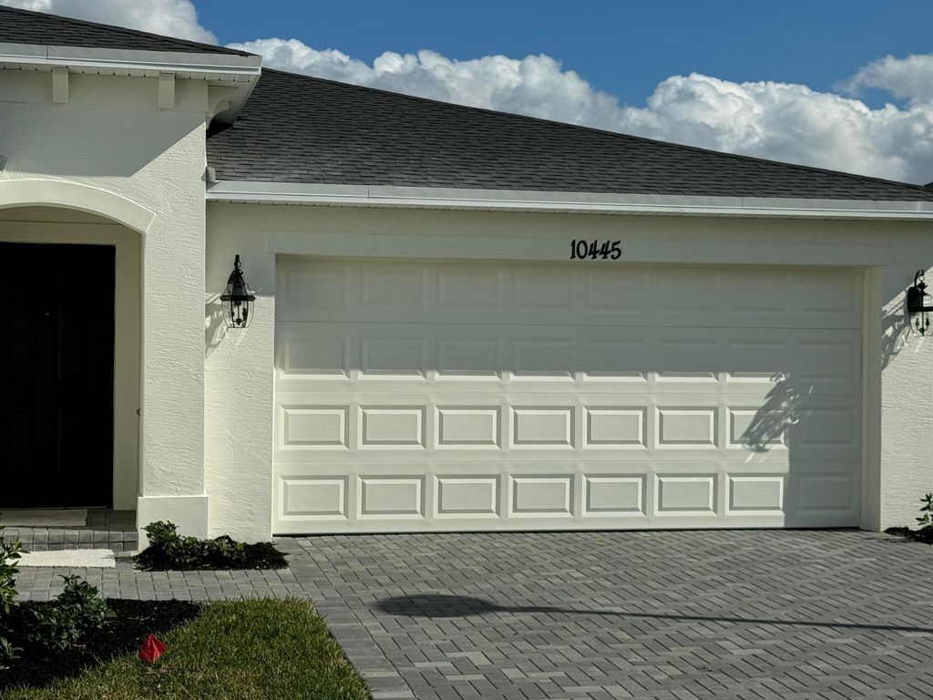 Photo of 10445 NW Suncrest Lp Loop, Port Saint Lucie, FL 34987 (MLS # B26016613)