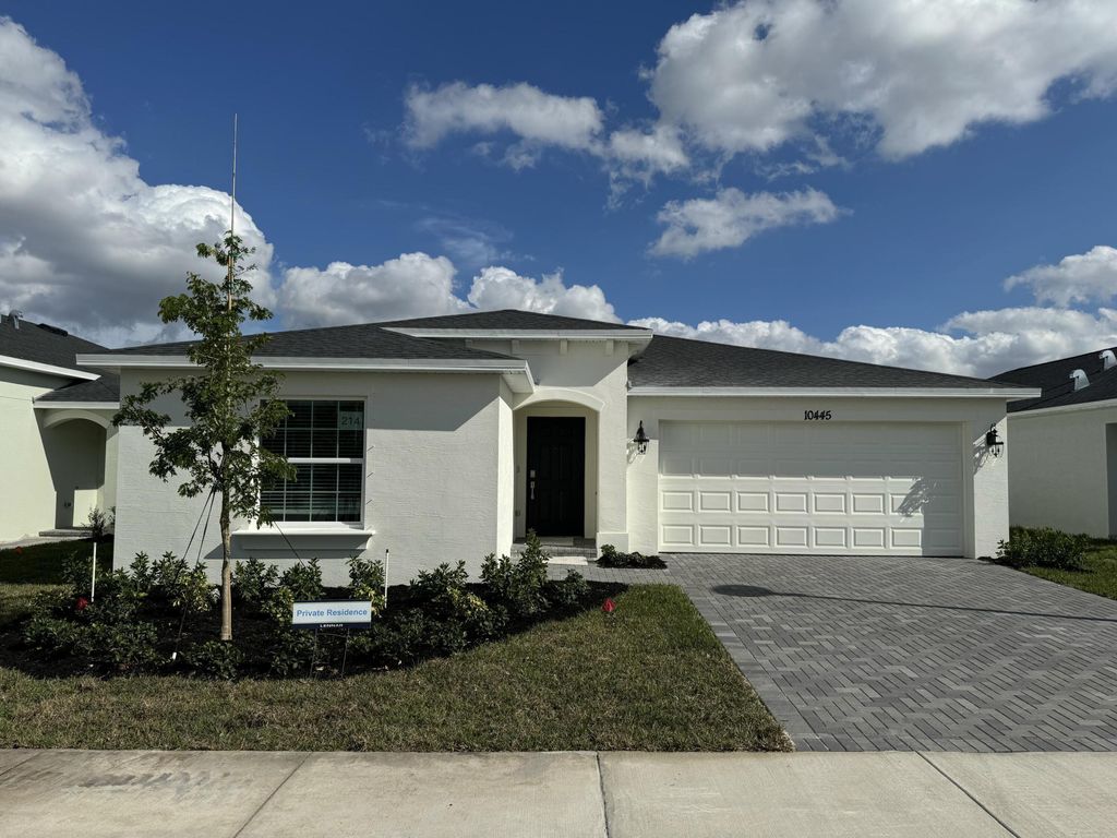 Photo of 10445 NW Suncrest Lp Loop, Port Saint Lucie, FL 34987 (MLS # B26016613)
