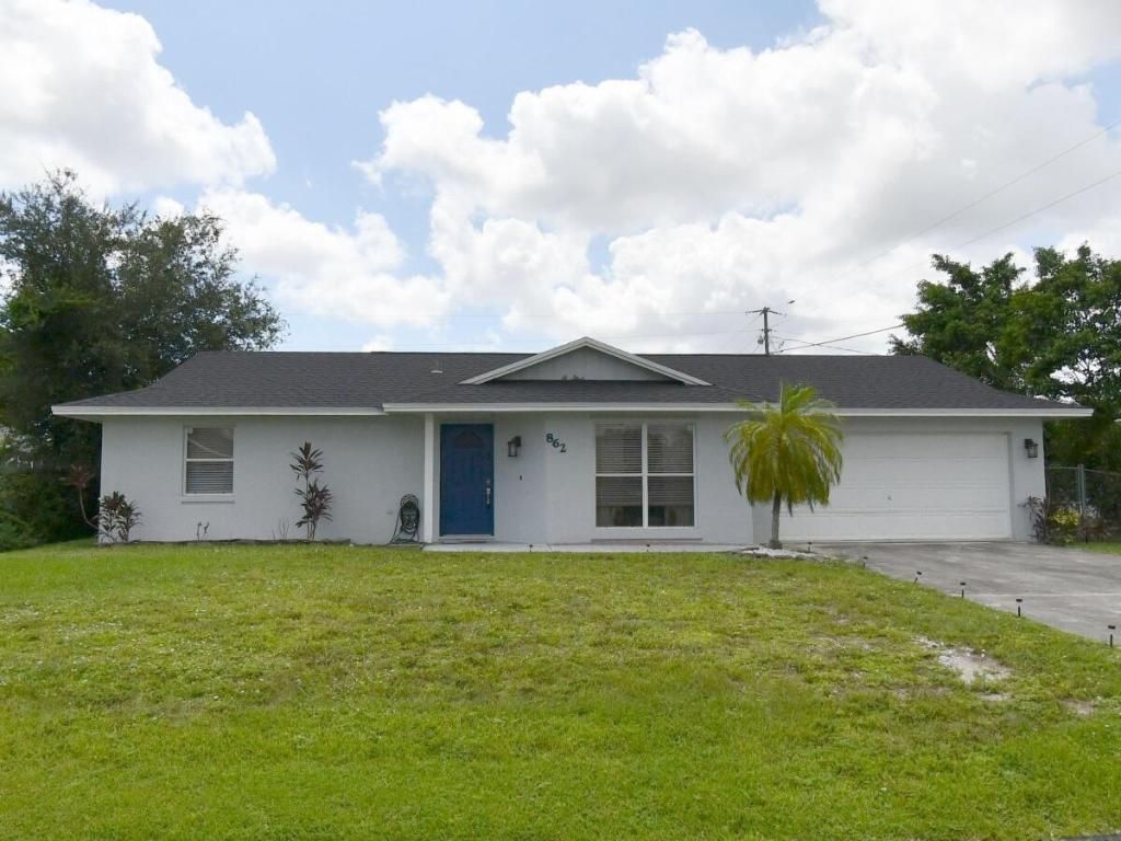 Photo of 862 SW Harvard Road, Port Saint Lucie, FL 34953 (MLS # R10972936)