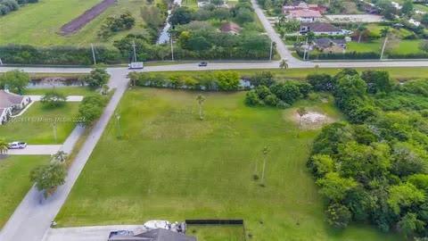 Lot has been FULLY CLEARED!Soil test completed and ready to build.There is NO HOA.This is THE LARGEST LOT on this quiet street in Davie.This is a corner lot with a side canal. Very close to Weston and excellent schools, parks, access to the highways and shopping plazasAgent Sandra Ramdath for further information
