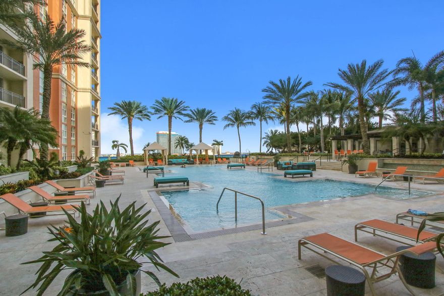 Live in one of the most sought after buildings in West Palm Beach. Enjoy relaxed living, concierge service, chic lobby, friendly staff, great amenities which include infinity pool, summer kitchen, fitness center, massage room, activity room with pool table. This 3/2 unit offers spectacular city and ocean views. Tandem parking just accros the hall from the unit. A must see!