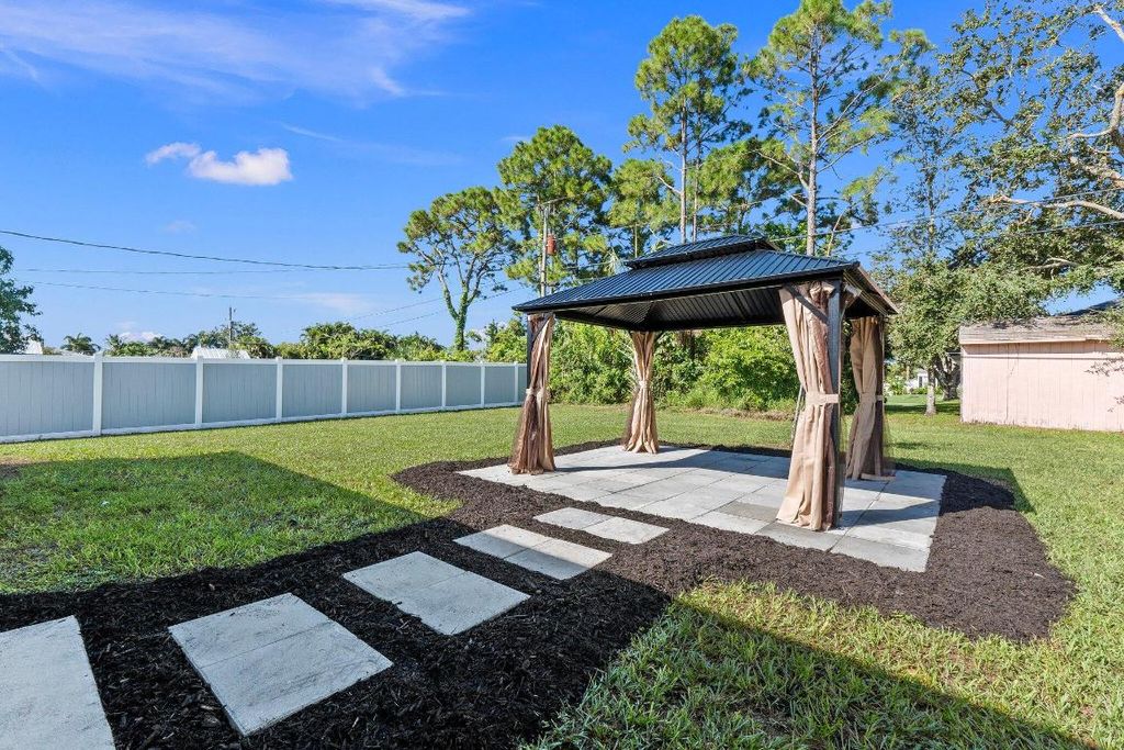 Photo of 1075 SW Fenway Road, Port Saint Lucie, FL 34953 (MLS # R11024597)