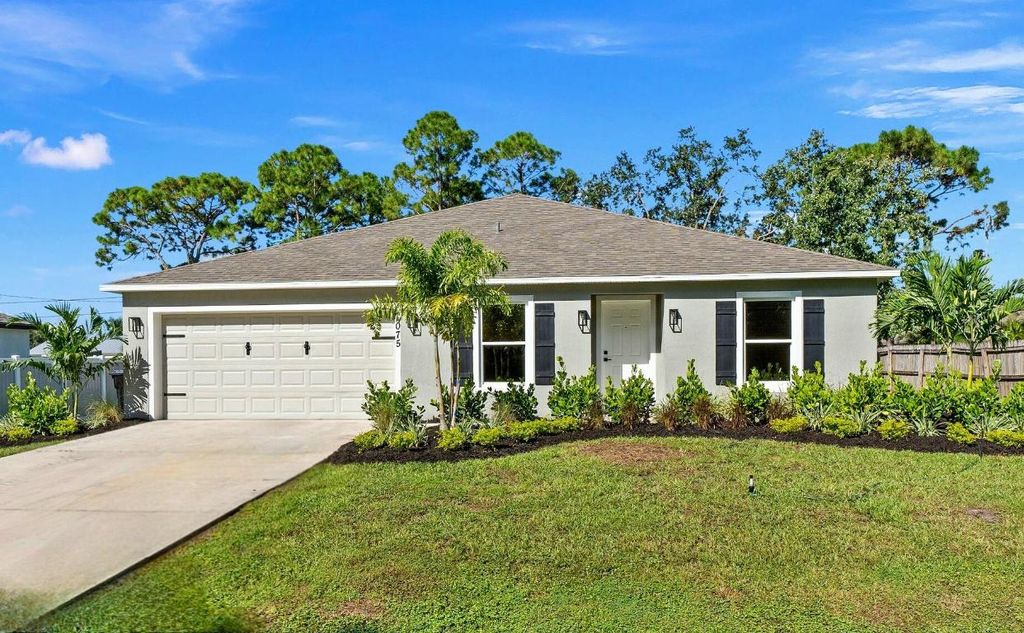 Photo of 1075 SW Fenway Road, Port Saint Lucie, FL 34953 (MLS # R11024597)