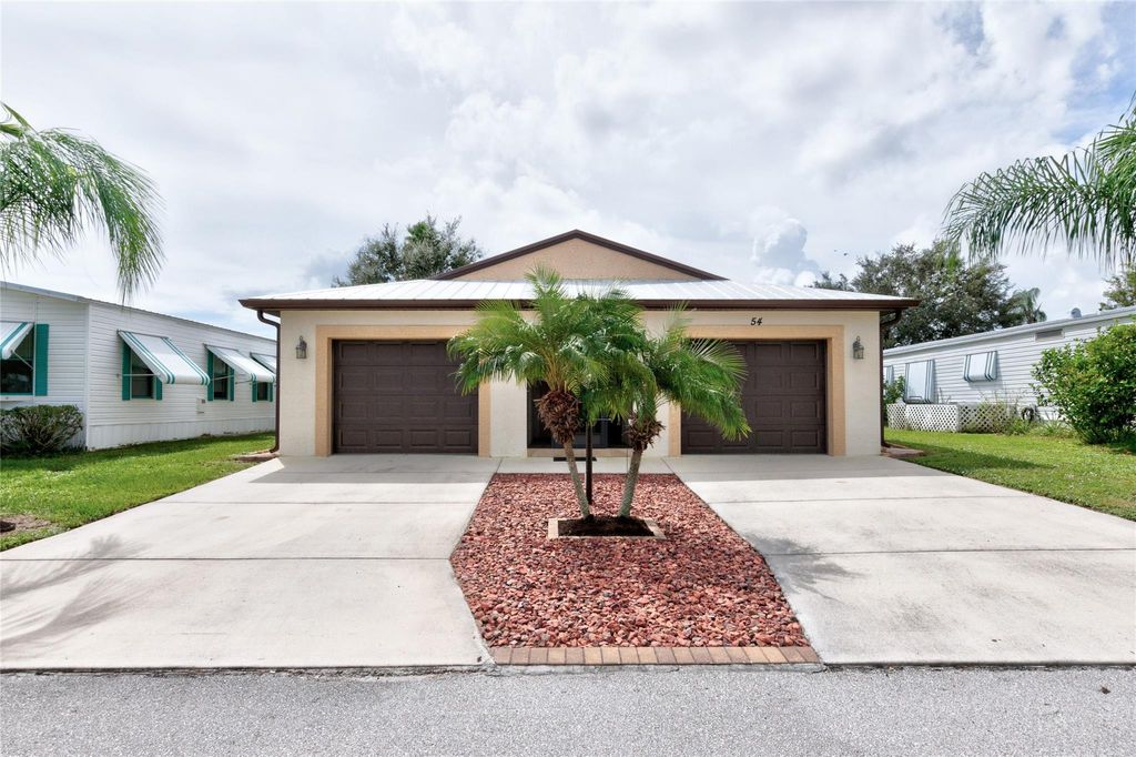 Photo of 54 Lagos Del Norte, Fort Pierce, FL 34951 (MLS # F10406729)