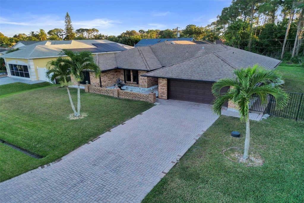Photo of 766 SE Cavern Avenue, Port Saint Lucie, FL 34983 (MLS # F10538366)