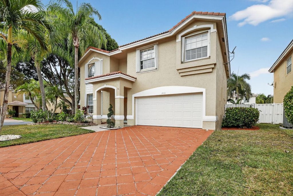 Photo of 2351 138 Drive, Sunrise, FL 33323 (MLS # F10546047)