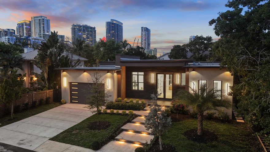 Brand New 2026 Construction in Rio Vista on +/-9,400 SF lot. Extra large lot gives a superior 1-story build with soaring 14 Ft. ceilings 4 bedrooms 4.5 bathrooms PLUS a large office/study. 2 car garage and the backyard facing north soak in the hot tub or swim in the pool overlooking gorgeous views of downtown Fort Lauderdale. The backyard also boasts over 500 SQFT of covered outdoor living. Rio Vista is one of Fort Lauderdale's premiere neighborhoods with mature oak trees & central to everything you'd need to enjoy Fort Lauderdale. Walking distance to downtown Fort Lauderdale and Las Olas nightlife, restaurants and shopping. 2.5 miles to Fort Lauderdale Beach, 15 minutes to Fort Lauderdale International Airport.