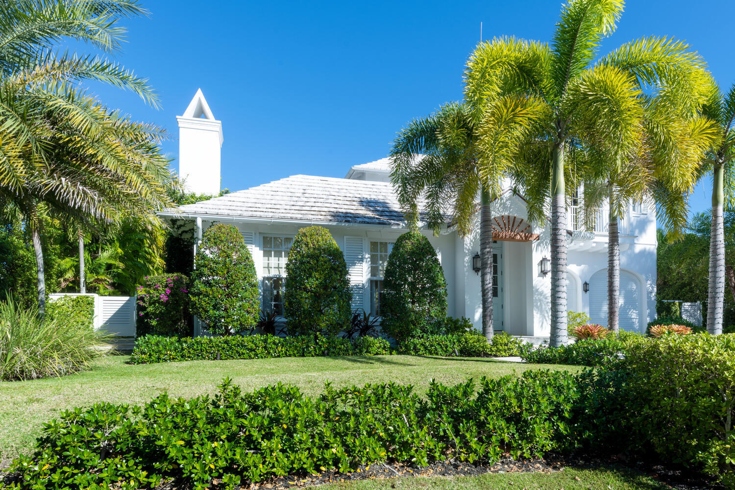 Discover Palm Beach living at its finest in this exquisite West-Indies inspired residence boasting 4 bedrooms and 5.1 bathrooms. Nestled on a serene street in the coveted north-end, just a block from the beach, this meticulously crafted home combines timeless elegance with laid-back coastal charm. Impeccably designed and completed in 2019, every corner exudes quality and attention to detail. abundant natural light flowing through the home's design. Whether you seek a tranquil retreat or love to entertain, the courtyard pool area offers the perfect setting. Don't miss the chance to experience the seamless blend of luxury and comfort and enjoy the opportunity to lease this home.