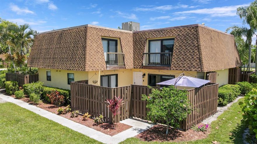 Move right in to this beautifully remodeled townhome in the heart of Jupiter. Kitchen features new leathered granite finish counter top and backsplash  with gorgeous stainless steel appliances. Maintenance free wood look waterproof vinyl plank flooring throughout. Light and bright with two sets of sliding glass doors that lead to a large open and private patio great for outdoor dining and living. Spacious dining area and separate living room. Fantastic master bedroom with 12 ft. barn doors which open to a wall of closet space with built in shelves. The master bath features dual sinks and quartz counter tops. Each bedroom has sliding glass doors that bring in lots of light. Very low HOA. Swimming pool plus a community day dock with ocean access boating. Easy access to 95.