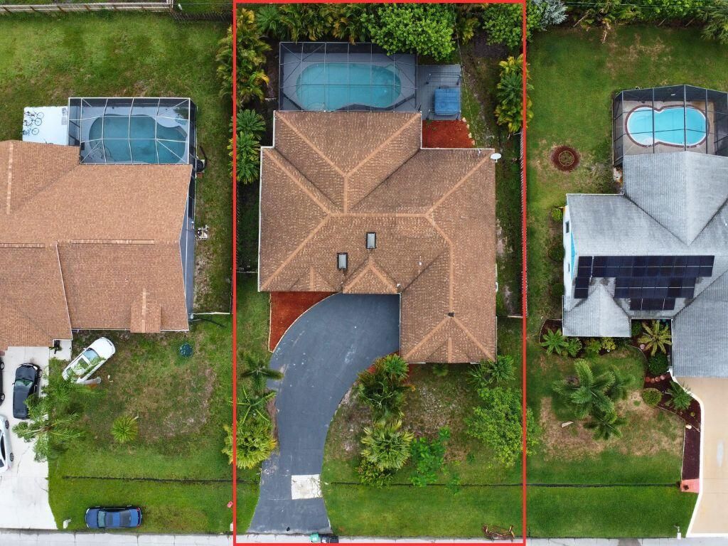 Photo of 925 SE Streamlet Avenue, Port Saint Lucie, FL 34983 (MLS # R10995608)