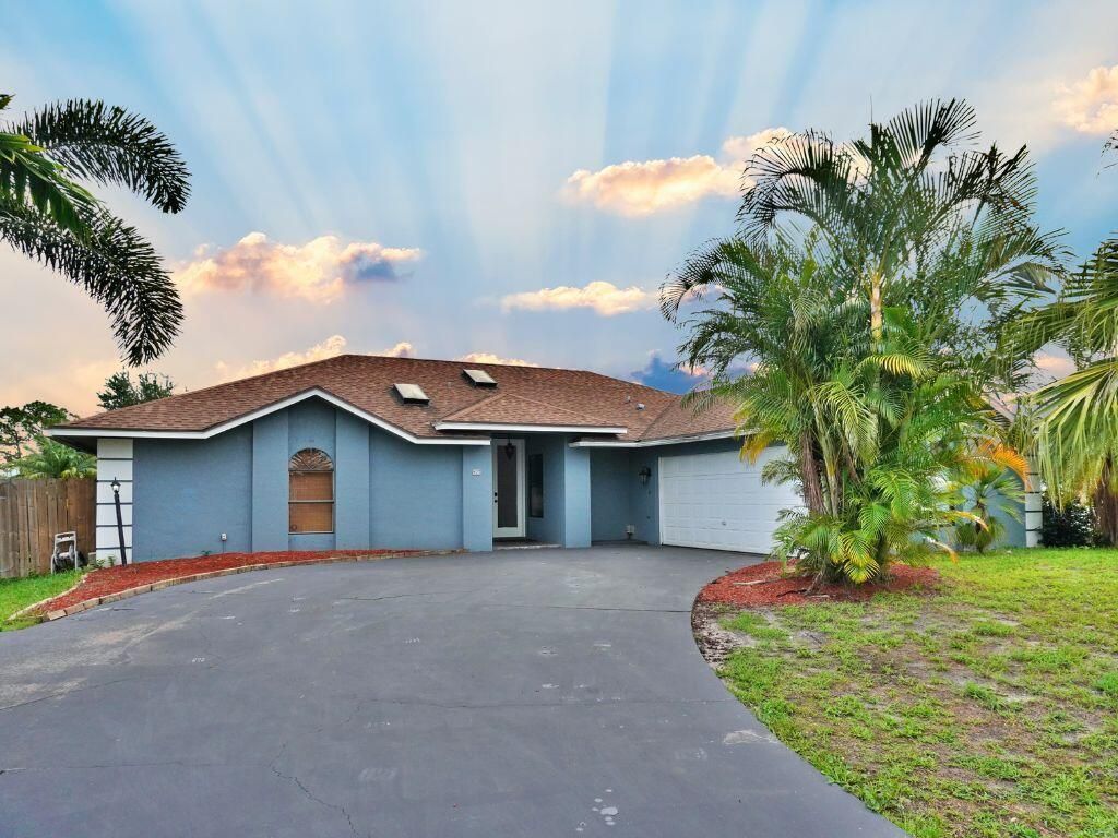 Photo of 925 SE Streamlet Avenue, Port Saint Lucie, FL 34983 (MLS # R10995608)