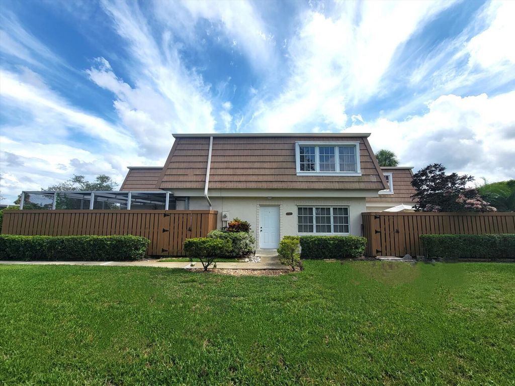 Photo of 11615 Winchester Drive #D, Palm Beach Gardens, FL 33410 (MLS # R10905565)