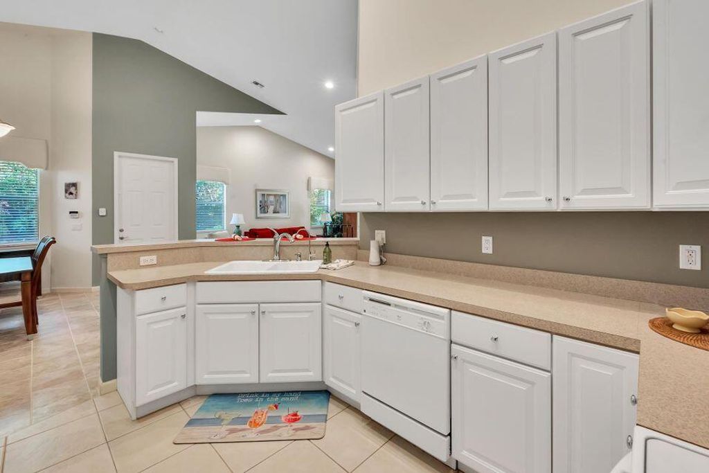 Photo of 9503 Crooked Stick Lane, Port Saint Lucie, FL 34986 (MLS # R11012323)